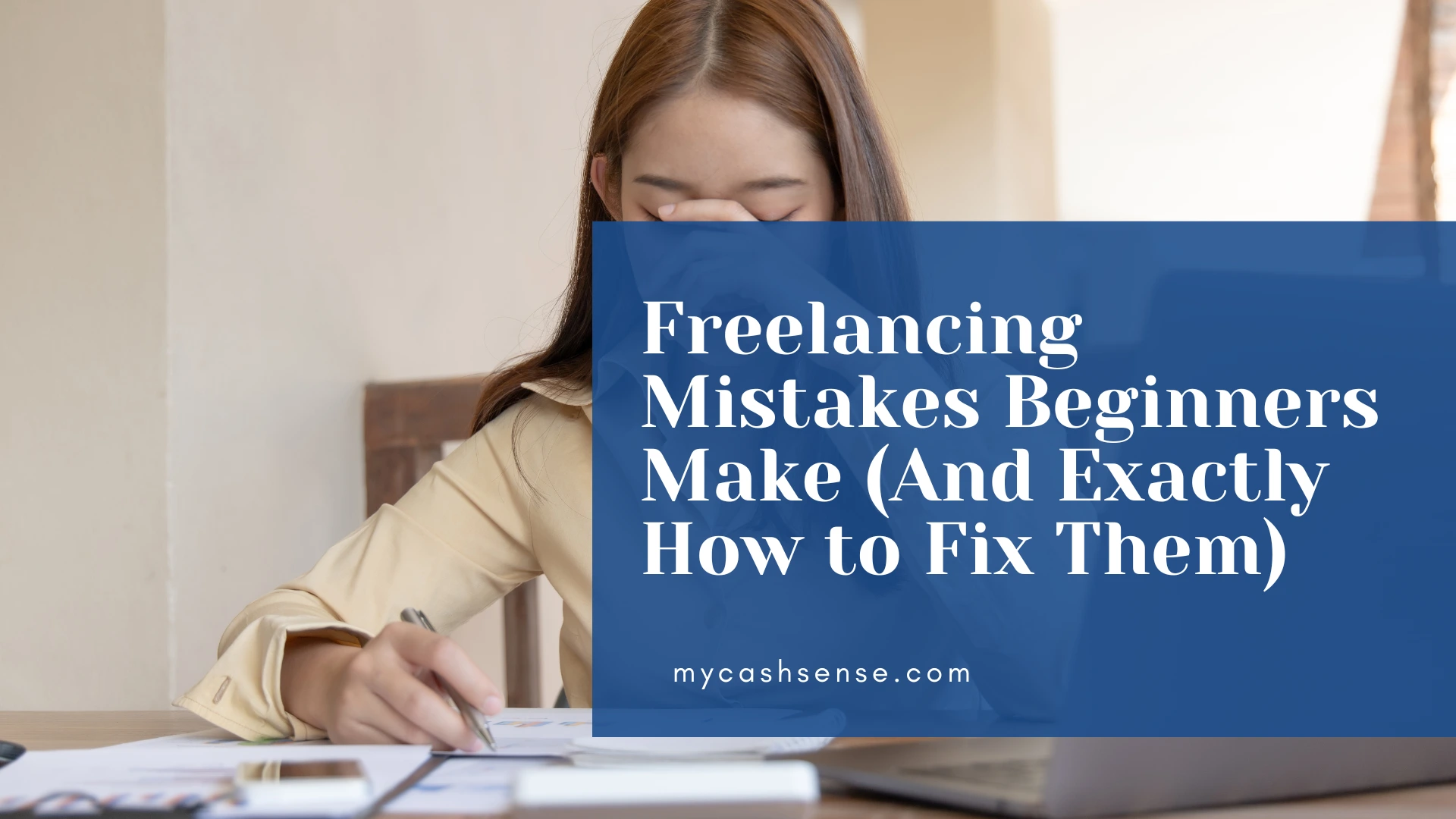 Overwhelmed freelancer with hand over face next to paperwork, featuring text overlay "Freelancing Mistakes Beginners Make (And Exactly How to Fix Them)."