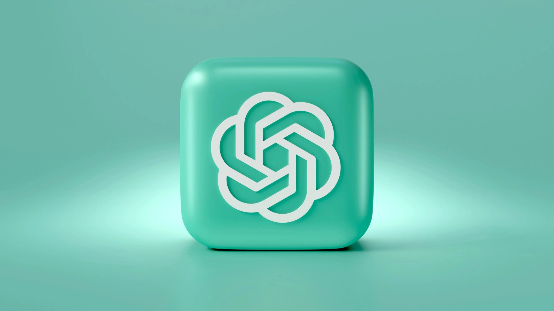 3D render of the OpenAI logo in white on a teal, rounded square icon against a teal background.