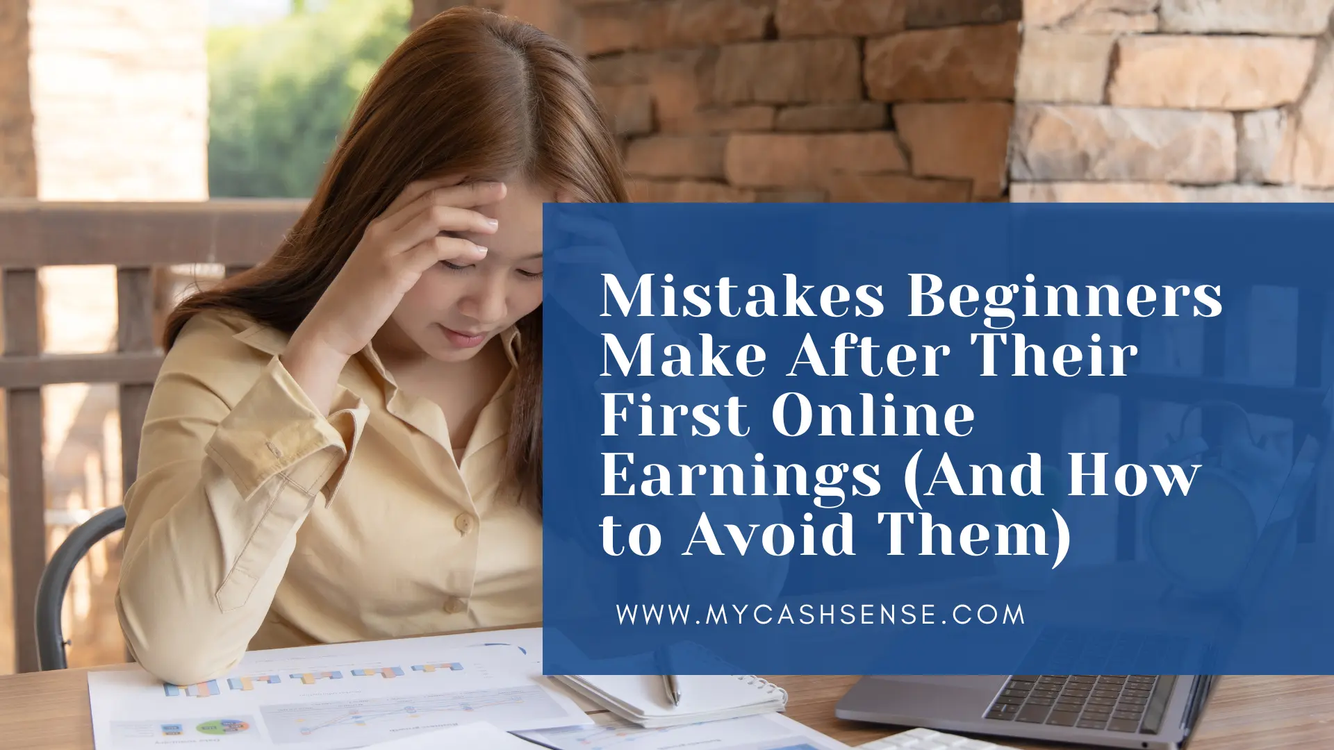 A woman sits at a table with papers and a laptop, holding her forehead beside the headline “Mistakes Beginners Make After Their First Online Earnings (And How to Avoid Them)” and mycashsense.com.